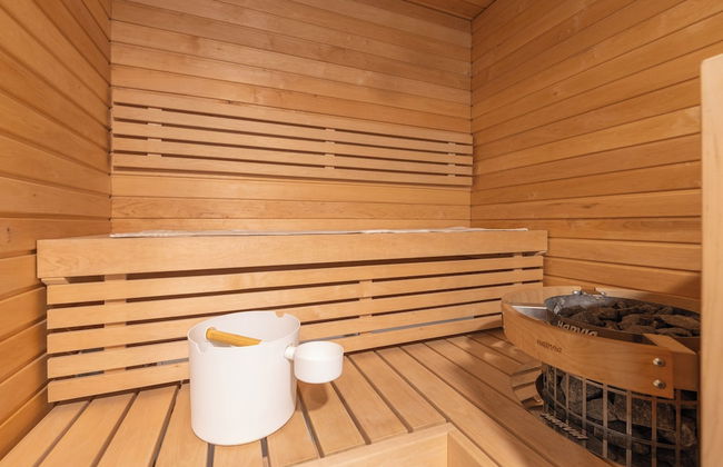 Historical 1BR Penthouse with Sauna - Photo 14