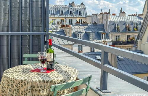 Montmartre vue sur les toits de Paris et la Tour Eiffel - Foto 20