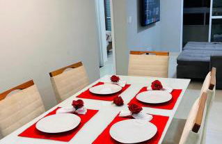 APTO BEIRA MAR - ACONCHEGANTE _ VARANDA GOURMET - WIFI - NETFLIX - TV A CABO - PRAIA GRANDE - Photo 3