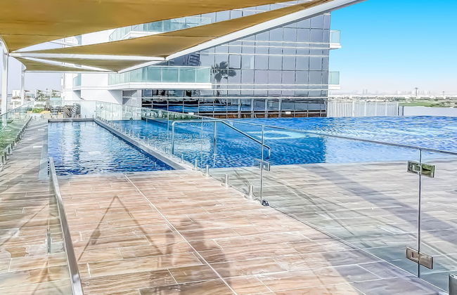 bnbme | Damac Hills Carson Tower | STUDIO - Photo 14