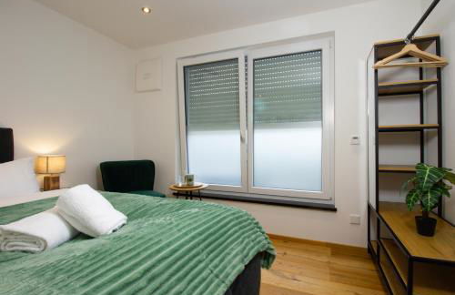 BeSSa Homes Deluxe Apartment 6 Personen Klima Garten King Size Betten - Foto 6