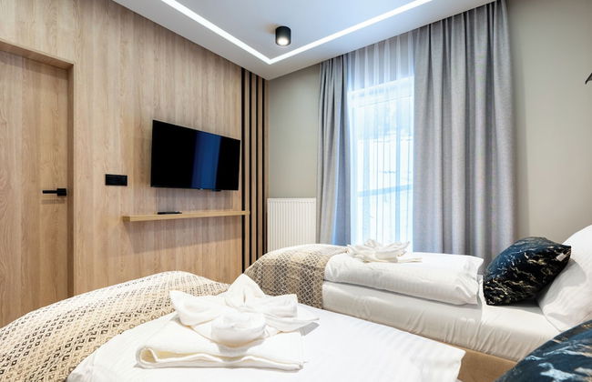 Apartamenty Sun & Snow Hillside - Photo 7