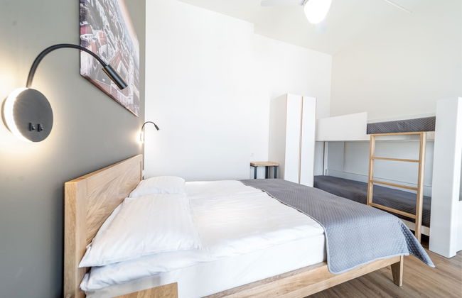 TopFloor Apartments - Photo 4