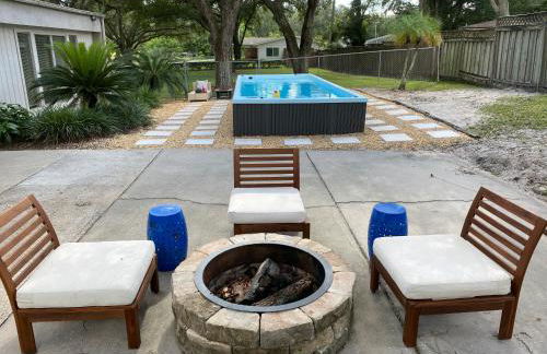 Reel relaxing across from River in Huge 24 foot Swim Spa - Photo 1