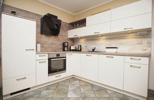 idyllsiche Lage, Ferienwohnung mit Terrasse, Meerblick - Haus Sonnenblume FeWo 04 - Photo 11