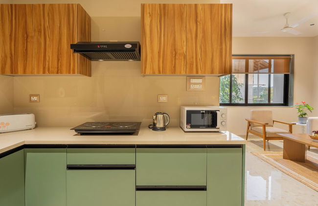 ELIVAAS Kamerios Verano 1 BHK with Pool - Photo 31