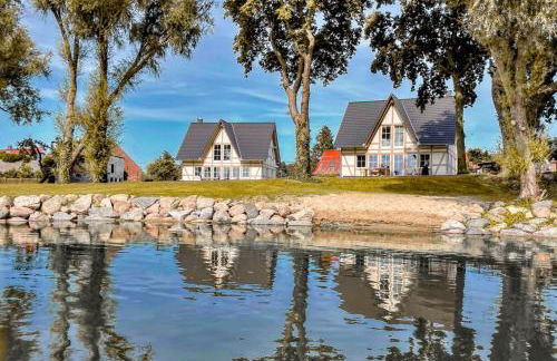 Watermark Usedom - Premium Ferienhaus direkt am Wasser mit eigener Badestelle - Haus Welle - Foto 2