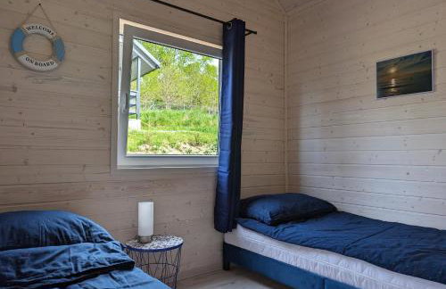 WIDOKI Rusinowo Domki Letniskowe - Foto 49