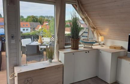 Kleines Apartement mit Dachterrasse und weitem Ausblick - Foto 10