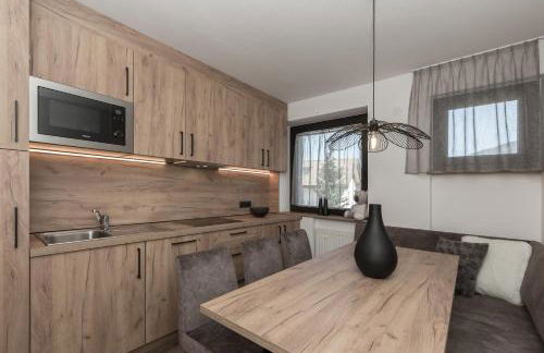 Aparthotel Familiaris - Family Apartments - Pools & Spa in Dolomites - Foto 29