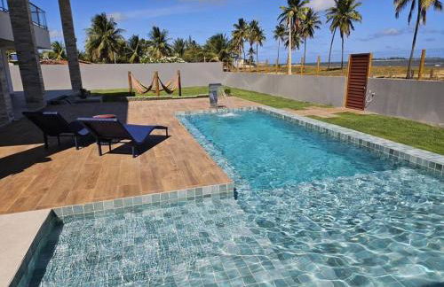 Piscina aquecida, 5 suítes e pé na areia com vista espetacular!! - Photo 28