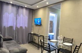 Apartamento Aconchegante Próximo ao Aeroporto - Photo 1