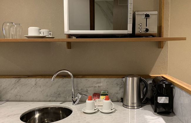 AQ Tailored Suites - Foto 36