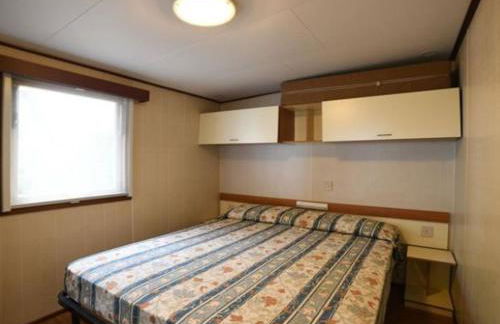 Mobile Home in Ferienresidenz mit Pool - Foto 16