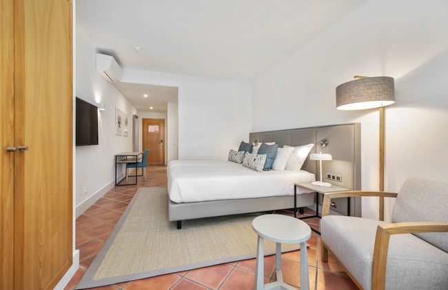 The Patio Suite Hotel - Photo 6