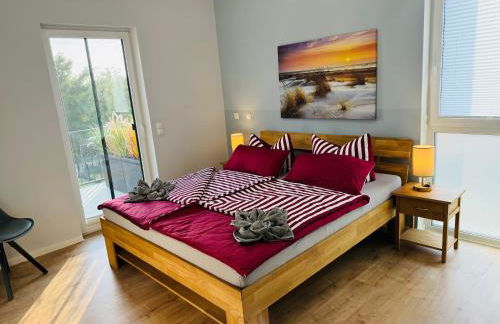 8 Personen Ferienhaus ,,Seegelblick" am Goitzschesee, erste Reihe am Strand mit Sauna, Whirlpool, Kamin, Wallbox & SUP - Foto 11