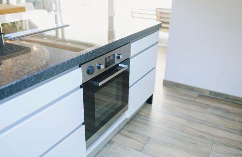 Lichtdurchflutete Wohnung mit großer Dachterrasse - Foto 14