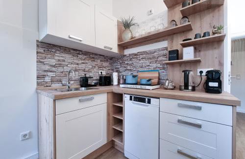 Alpha Apartments - Photo 32