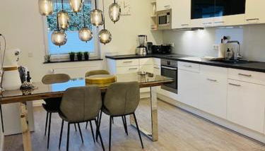 Erstklasssige moderne Apartwohnung 85 qm mit Terrasse und Garten - Foto 3