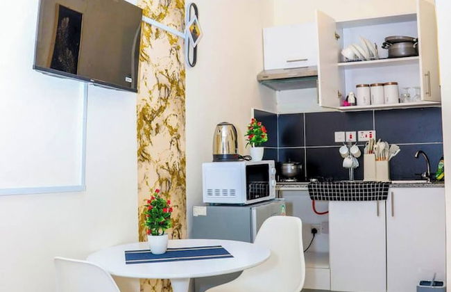 Peaceful And Unique Studio Jkia Airport Stay - Photo 1