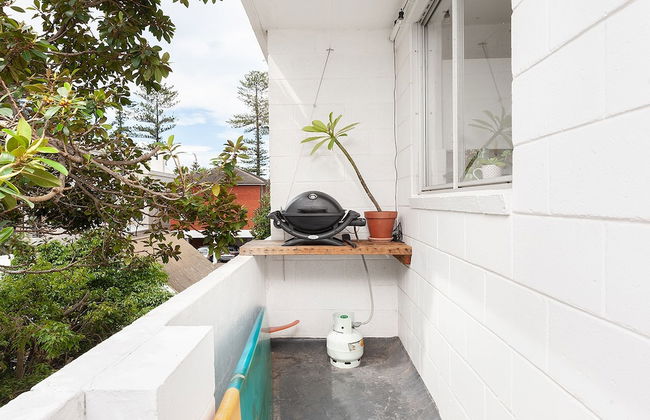 Surf Side Oasis with Balcony near Beach - Photo 9