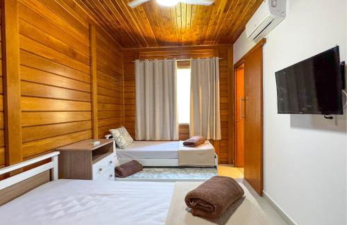 casadecastelhanos, Quadra do MAR de CASTELHANOS, 4 suítes com AR, Churrasqueira, Piscina, Hidromassagem, Cozinha INTEGRADA GOURMET Ideal para FAMÍLIA E AMIGOS - Foto 27