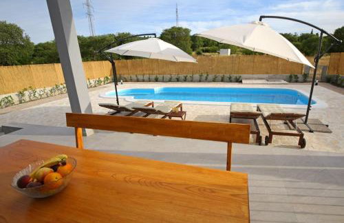 Modern Guest House Rak with beautiful pool - Photo 13