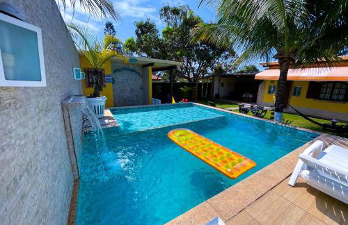 Recantos Pinheiros - Casa inteira, até 15 hóspedes - Piscina privativa, sinuca, ar condicionado e TVs nos 4 quartos - Condomínio Orla 500, lado praia - Unamar, Cabo Frio-RJ - Foto 1