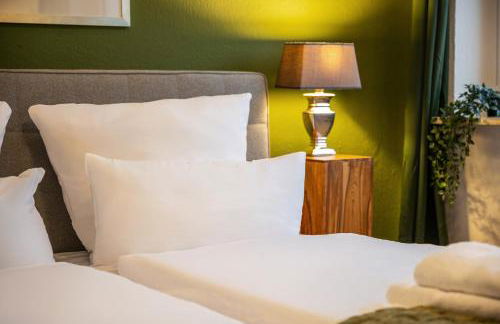 MAISUITES Sperling - Zentrale Ferienwohnung mit Boxspringbett, Kaffeevollautomat, WLAN & seitlichem Seeblick - Foto 21