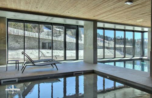 ARC 1600, LE RIDGE, Appartement 10 personnes Duplex Vue Montagne - ski aux pieds - Sauna, Hammam, Piscine, Salle de salle de sport-fitness - Foto 46