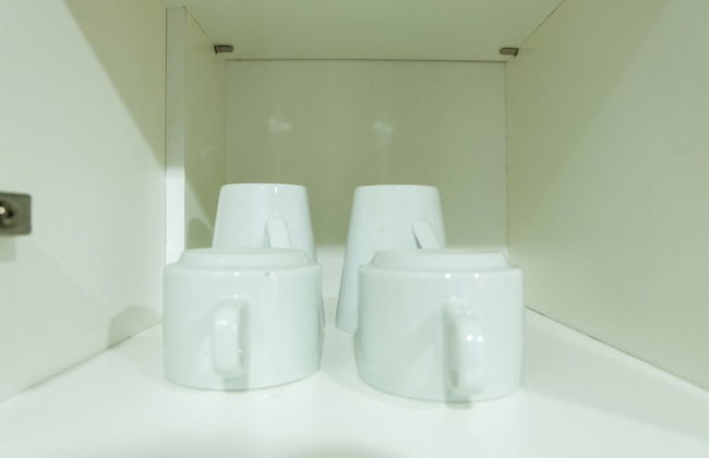 Studio Room Azalea Suites Apartment - Photo 12