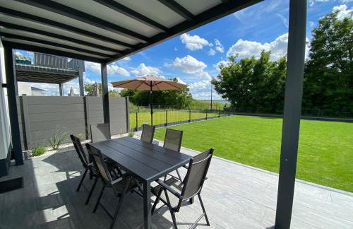 8 Personen Ferienhaus ,,Seegelblick" am Goitzschesee, erste Reihe am Strand mit Sauna, Whirlpool, Kamin, Wallbox & SUP - Foto 26