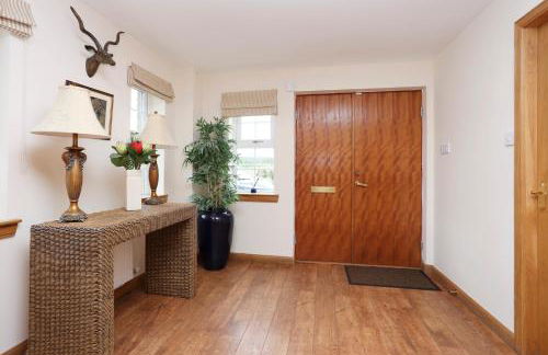 JOIVY Greenknowes Farmhouse with Hot Tub and Bar - Photo 34