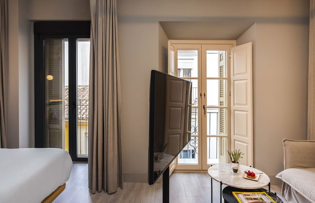 Coeo Peña Design Apartments - Photo 6