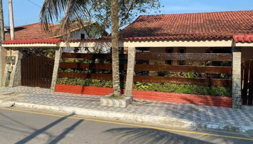 Ampla casa em condomínio a 300mt da praia - Foto 1