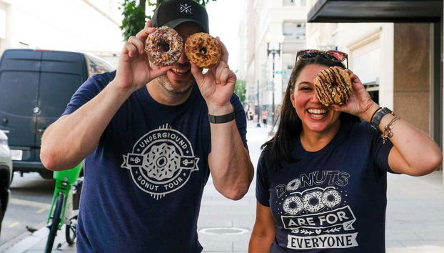 Two tourists enjoying the donut tour