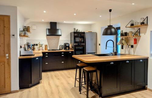 Grande ferme de 250m2 rénovée au charme rustique - Foto 11