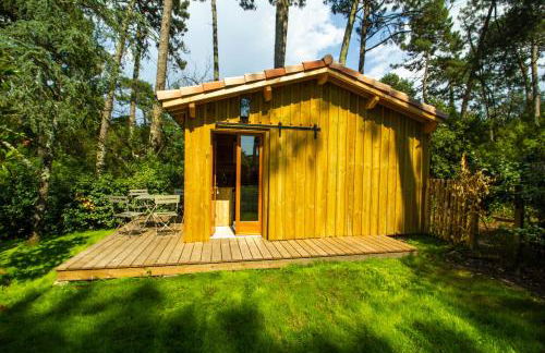 Cabane forêt proche plage avec piscine partagée - Foto 1