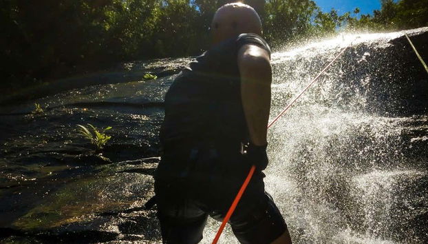 Rappelling activity at Calhetas Beach