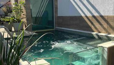 Casa com Piscina de Vidro e Sauna Integrada em Geribá com 5 quartos - Foto 1