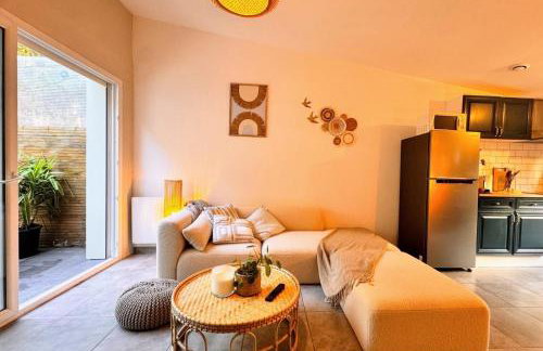 Maison Langevin 2-Bedroom House with Cozy Garden & Patio - Photo 24