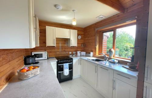 Beautiful 2BR Beach Lodge Set In Stunning Gardens - Pass the Keys - Photo 10