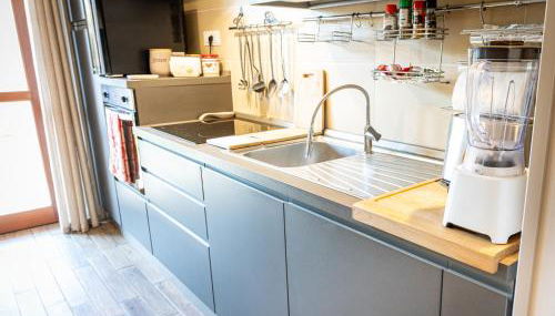 MRB Real Estate - Maison Ludovica - Monolocale Moderno con Giardino - Foto 2, stove, dishwasher