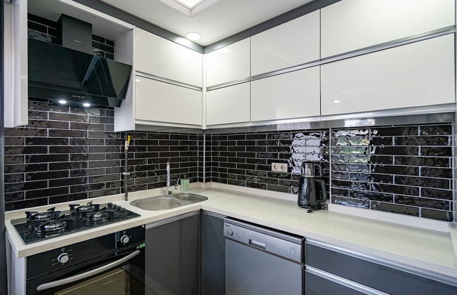 Eluxio Suite Hotel - Photo 33