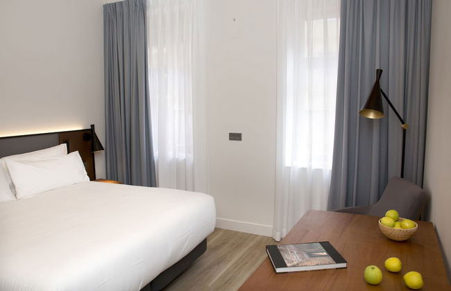 Prisma Suites - Photo 9