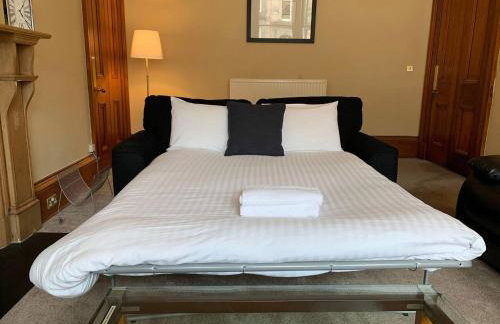 JOIVY Adorable 1 Bed Flat Near West End - Photo 23