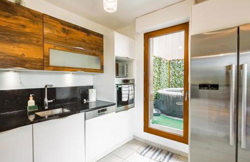 Paris au PETIT SÉSAME jacuzzi cosy Stade De France 6 personnes Wifi Terrasse Parking privé - Foto 20