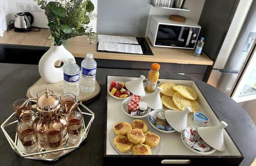 WonderSuite appartement - centre ville avec parking couvert -15mn de Paris et 10 mn de Stade de France, wifi, Netflix - Foto 9