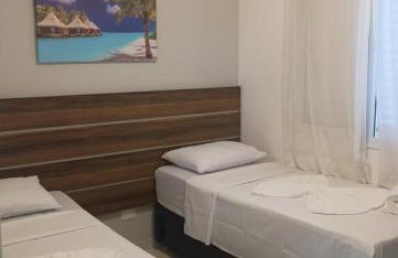 Apartamento 23A para 6 pessoas com Piscina e Churrasqueira no Cond Torremolinos Beach a 80m para Pé na areia na Praia da Enseada Ubatuba - Photo 3