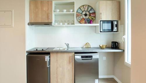 Zenao Appart'hôtels Suresnes - Foto 4, stove, storage